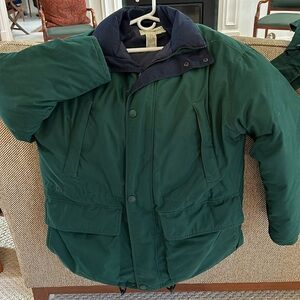 Eddie Bauer warm winter jacket with detachable cap. Hidden zipper pocket inside.